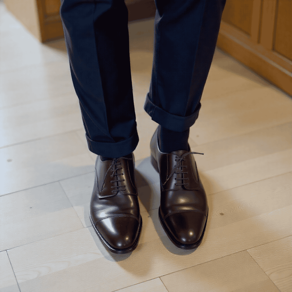 Tailor hemming trousers